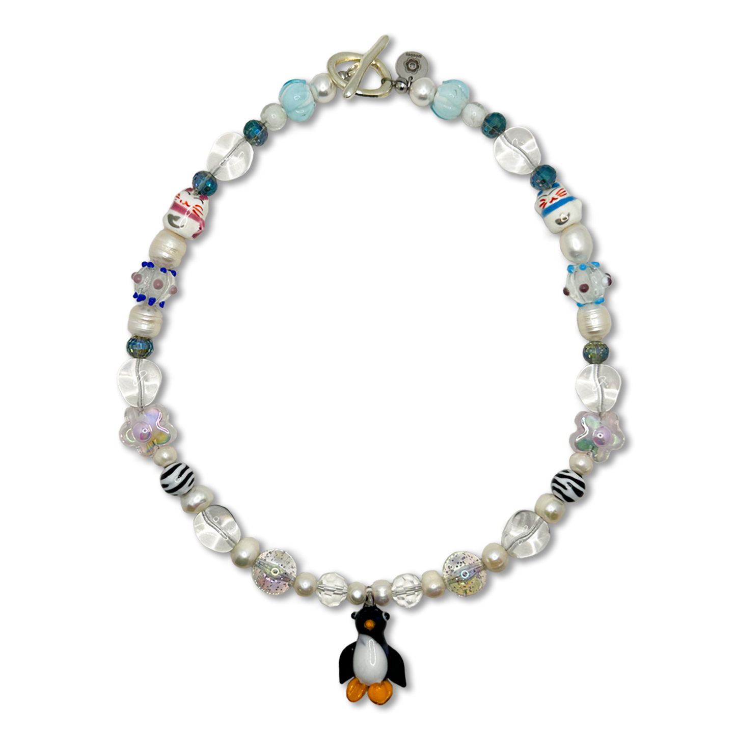 The Peng-Oui handmade pearl necklace. Made with real freshwater pearls. Front Photo. Penguin pendant.