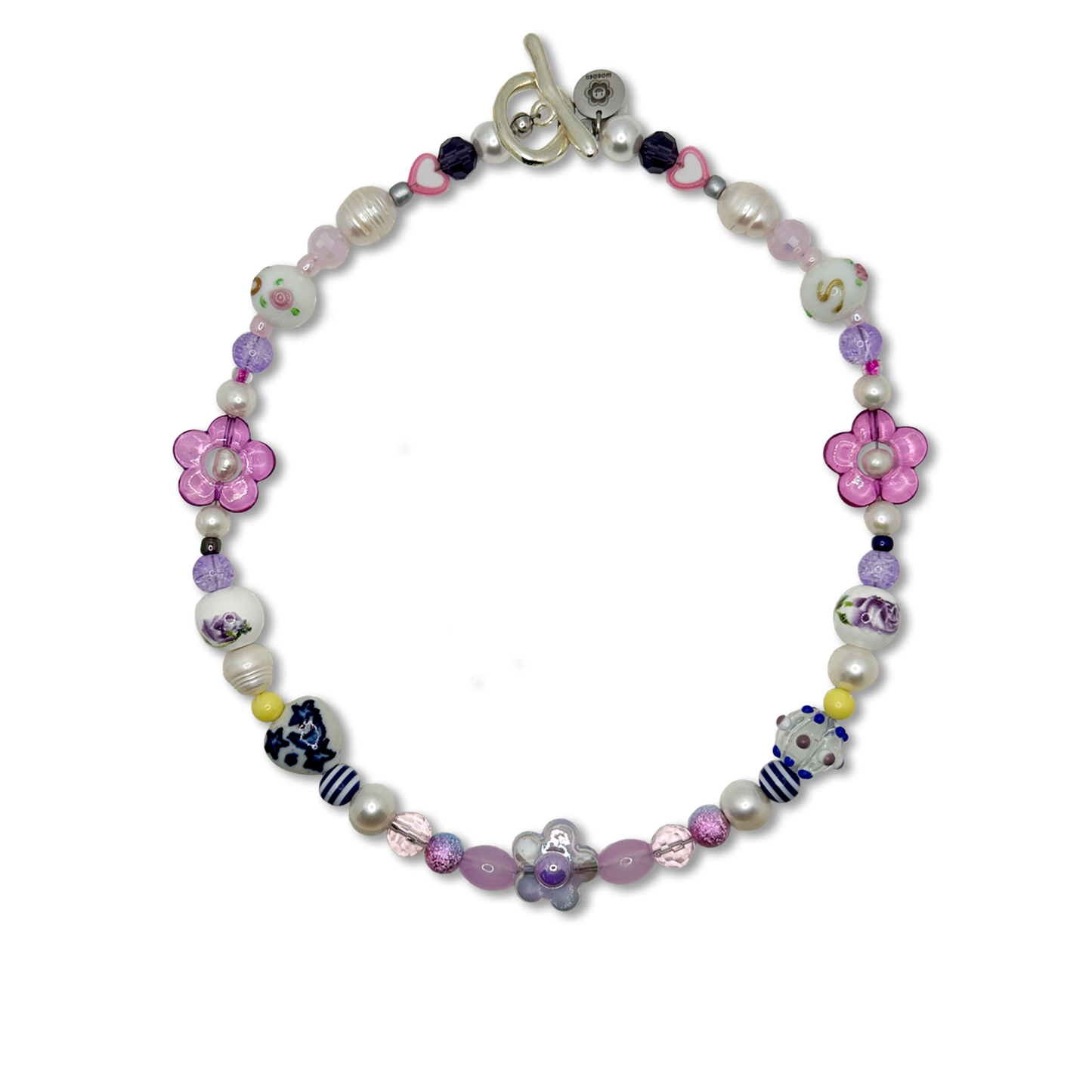 The Orchidya handmade pearl necklace is a fashion accessory made with real freshwater pearls. Front photo